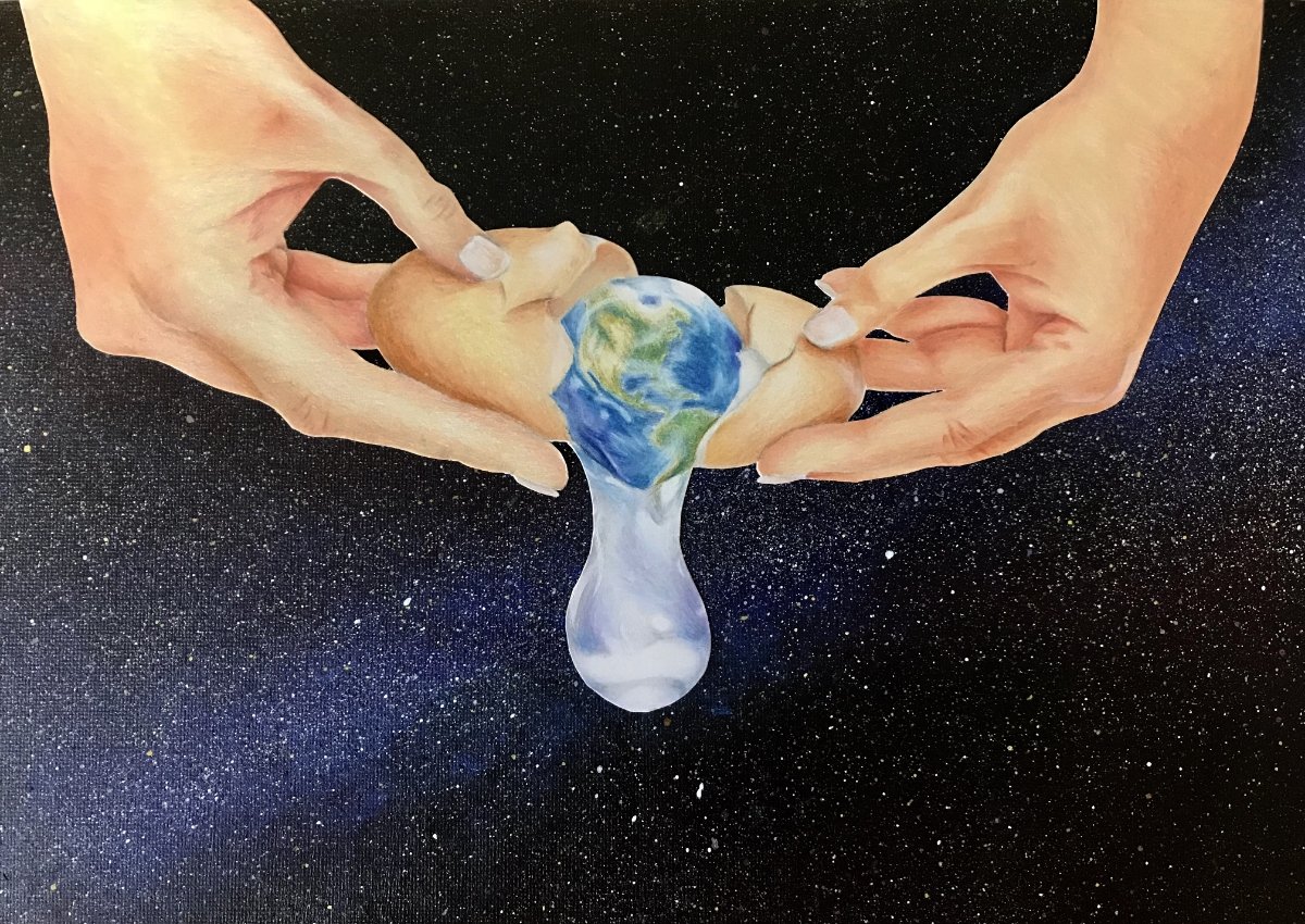 student drawing of the earth being cracked out of an egg shell