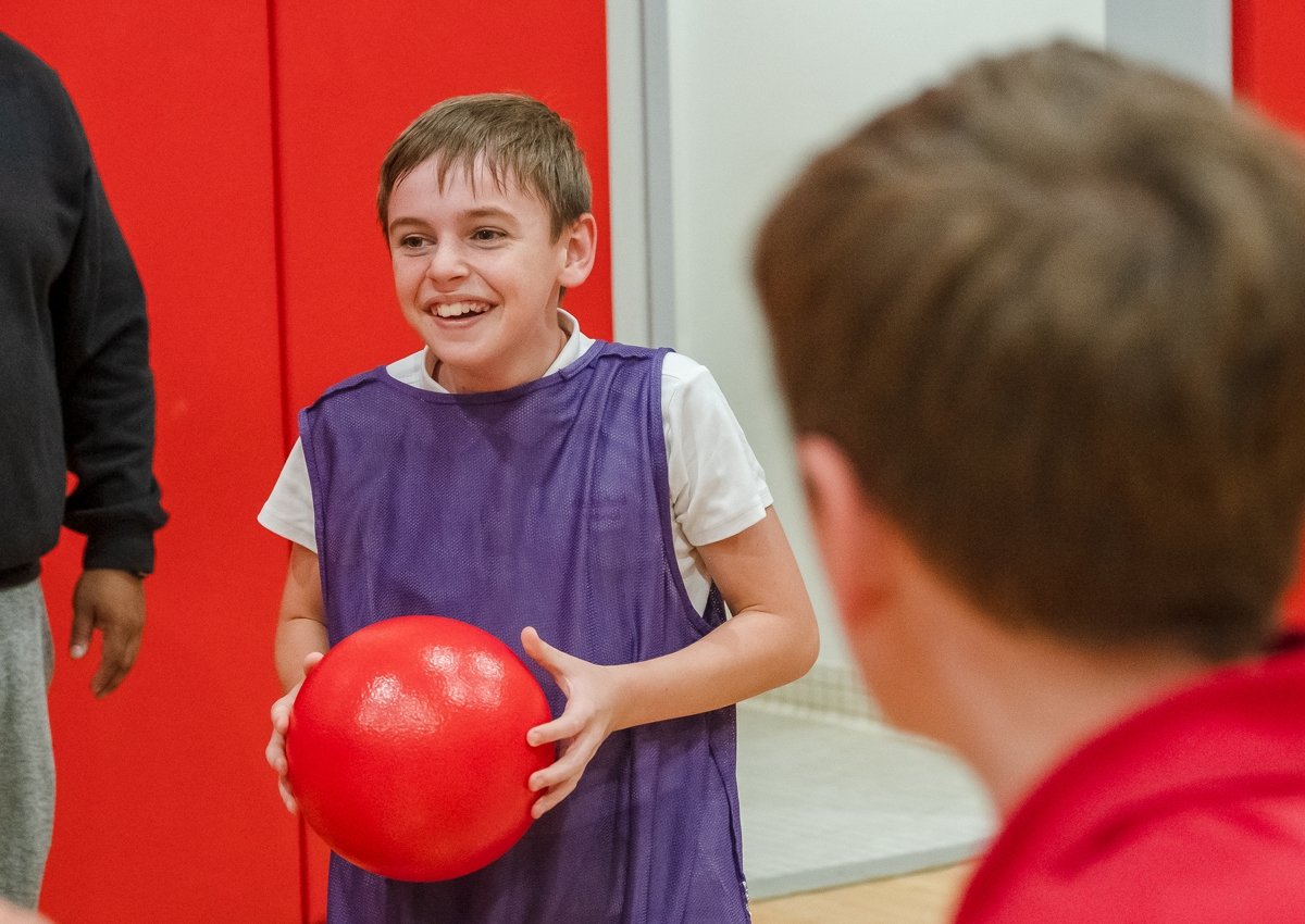 lower school students playing dodgeball